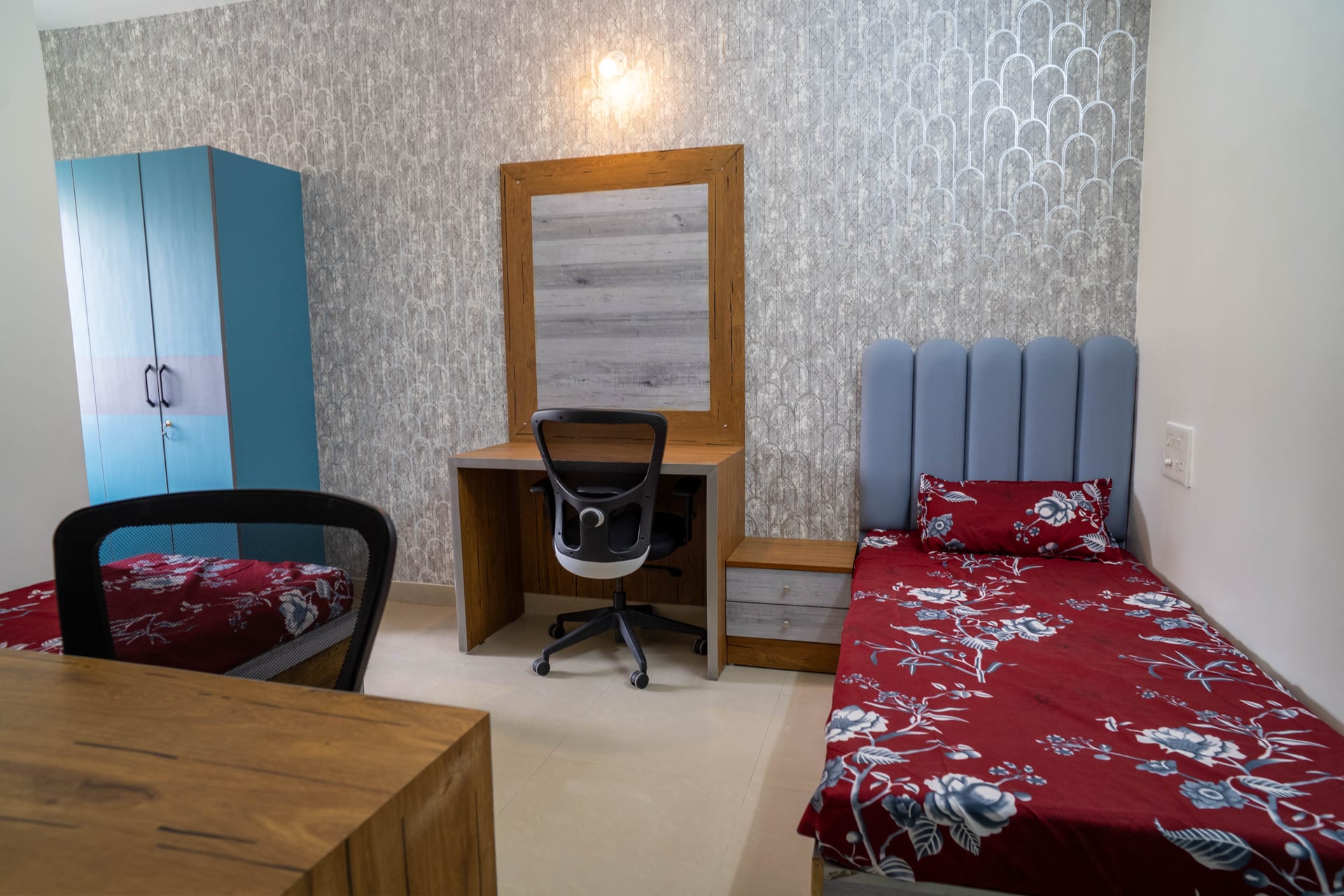 Furnished room with study desk at Valour House boys PG, Tavarekere, Bangalore